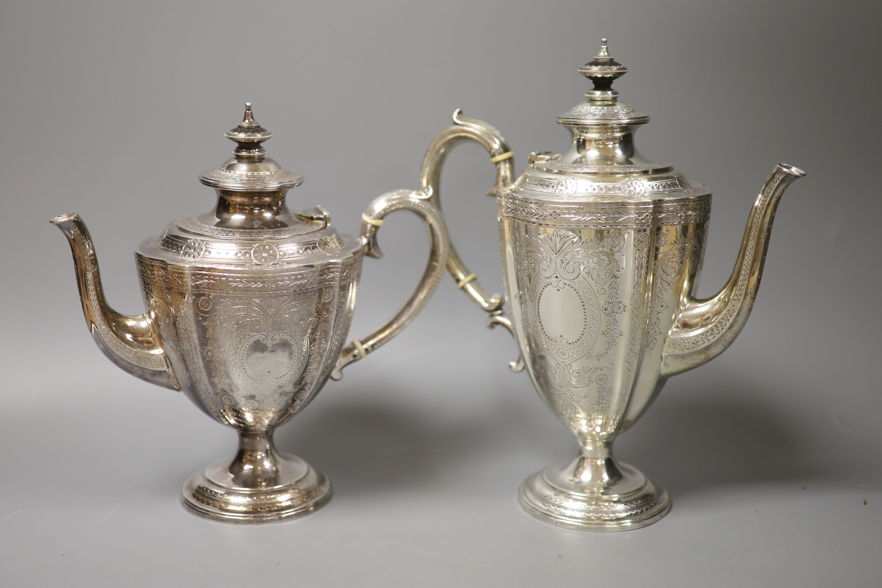 A Victorian engraved silver three-piece tea and coffee service, Frederick Elkington, Birmingham, 1872, tallest piece 27.5cm